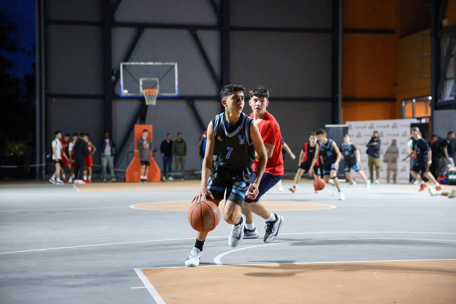 May be an image of 13 people, people playing basketball and basketball jersey