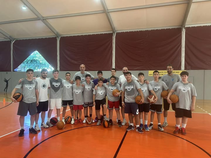 May be an image of 13 people and people playing basketball