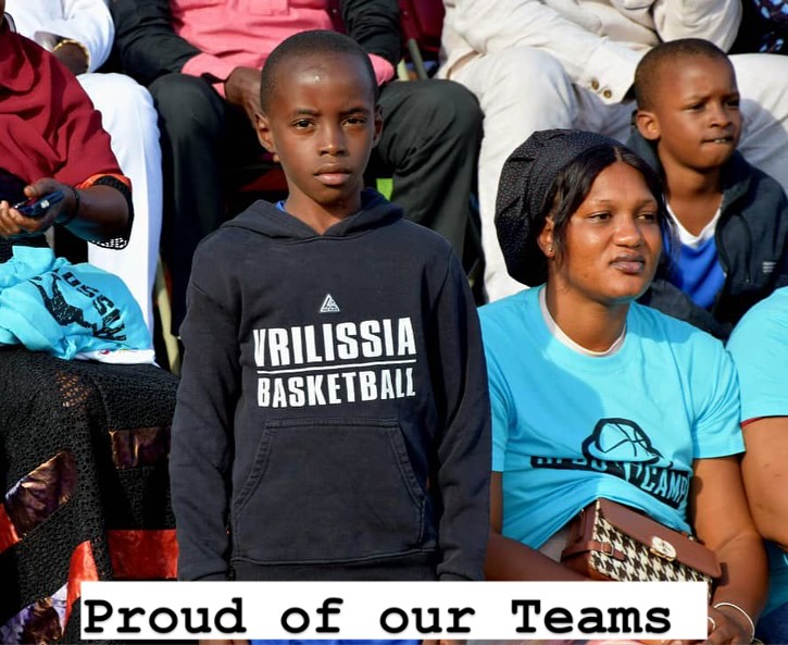 May be an image of 2 people, people playing basketball and text that says "！ VRILISSIA BASKETBALL LULAN CAM ProudofourTeams of our Teams Proud"